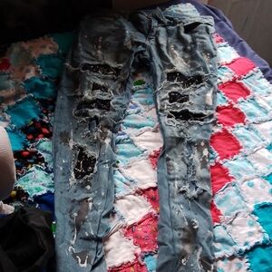 AMIRI Light Blue Distressed Skinny Jeans with Paint Splatter